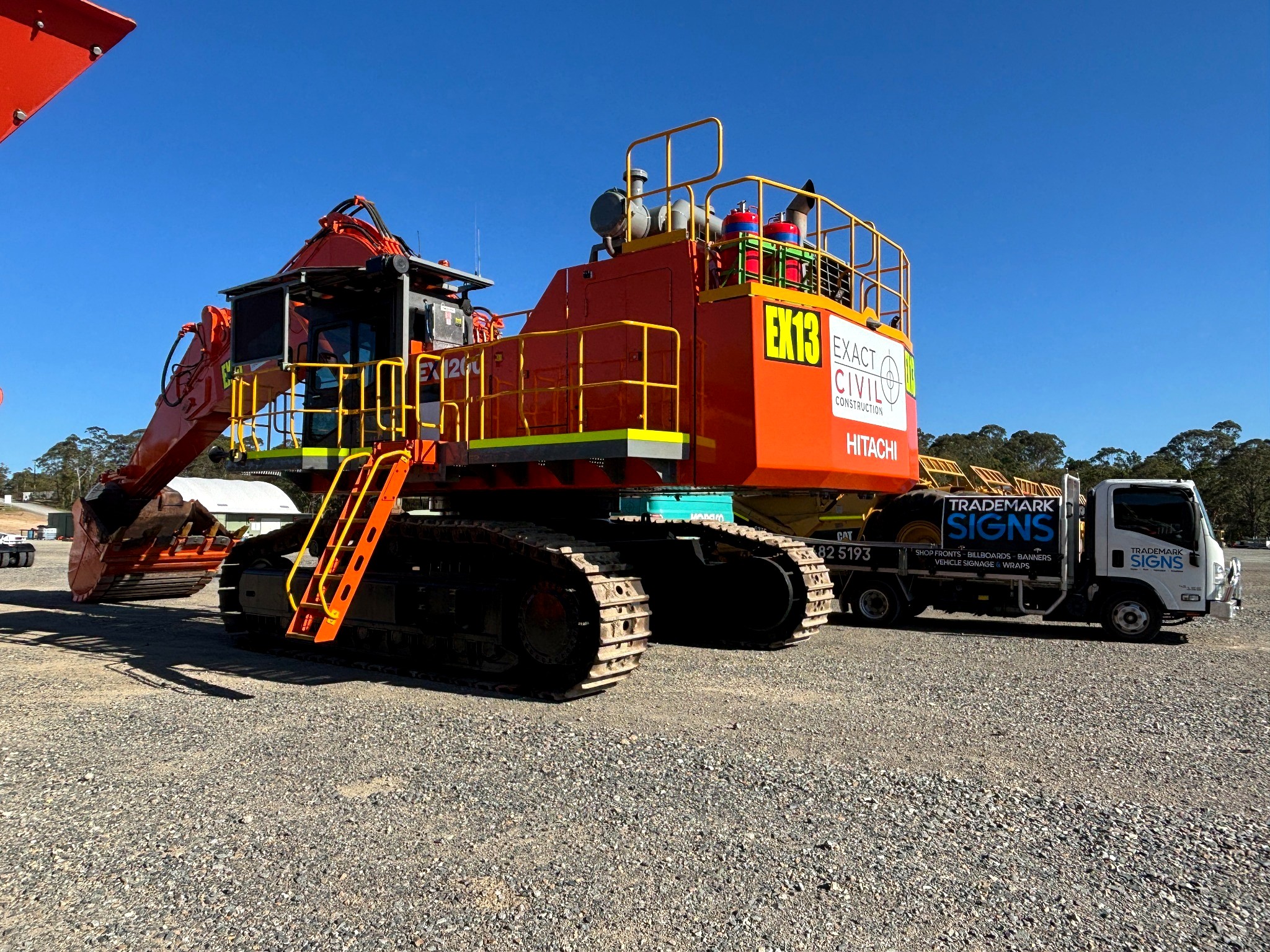 Large scale excavator branding by Trademark Signs